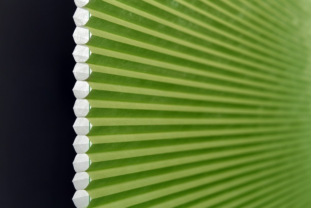 Close up image of Lime green pleated blinds - Blinds Norfolk - Norwich Sunblinds