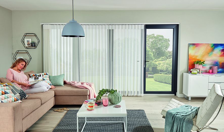White Allusion blinds in bifold doors in living room - Blinds Norfolk - Norwich Sunblinds