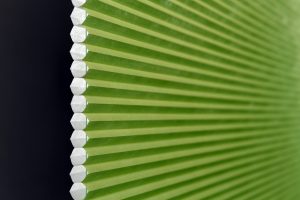 Close up of green Causeway pleated blinds - Blinds Norfolk - Norwich Sunblinds