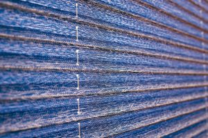 close up blue pleated blind fabric - Blinds Norfolk - Norwich Sunblinds