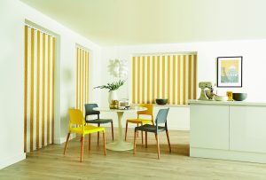 Mustard yellow vertical louvres alternated with white louvres - vertical blind in the dining room - Blinds Norfolk - Norwich Sunblinds