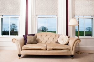 Cream Scripture fabric roller blinds in the lounge - Blinds Norfolk - Norwich Sunblinds