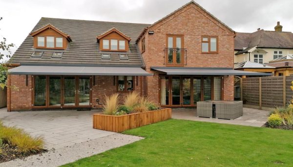 Awnings fitted to an home by Norwich Sunblinds