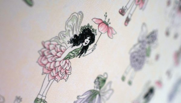 Purple Flower fairies with cream background in close up image of roller blind - Blinds Norfolk - Norwich Sunblinds
