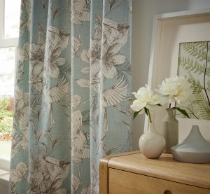 Powder Blue Floral Curtains in a Living Room. - Curtains Norfolk - Norwich Sunblinds