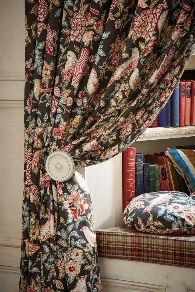 Close up of curtain with pink and cream flowers on dark background - Blinds Norfolk - Norwich Sunblinds