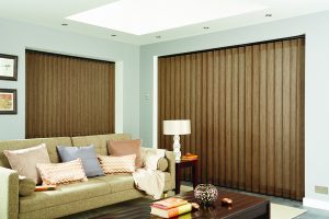 Floor to ceiling closed bronze vertical blinds in living room - Blinds Norfolk - Norwich Sunblinds