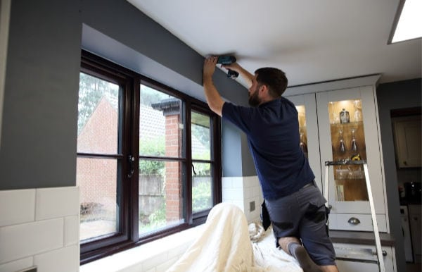 Shaun fitting the kitchen blind