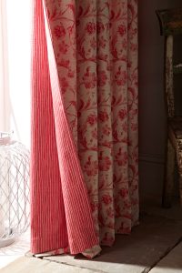 Close up of thick curtain with pink floral pattern - Blinds Norfolk - Norwich Sunblinds