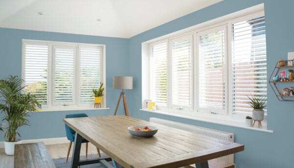Perfect Fit Shutter Lite installed by Norwich Sunblinds into a dining room setting