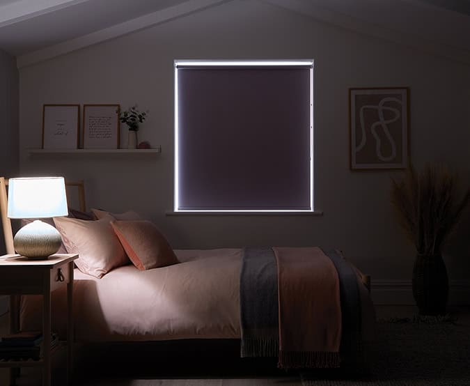 Blackout Blinds shielding light and some heat from a bedroom