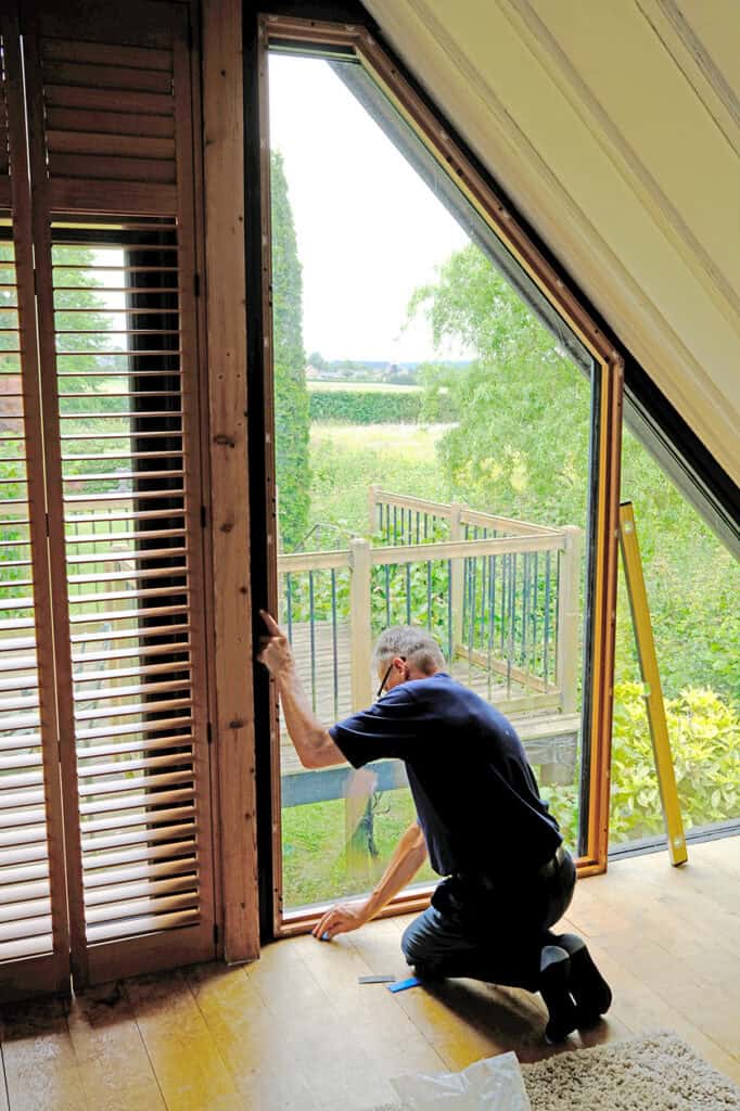 Getting ready to install the frame to support the plantation shutters